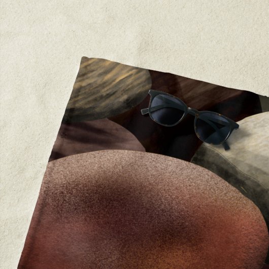 Steentjes en naam strandlaken (In situ)