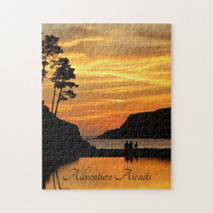 Stel en Hond op Strand bij Zonsondergang aan de Ca Legpuzzel