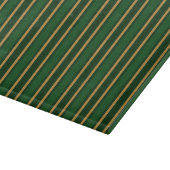 Stenen van snoep van Springbok, groen en goud Snijplank (Hoek)