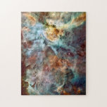 Ster- en doodsstrijd in de Carina Nebula Legpuzzel<br><div class="desc">Dit afbeelding is vrijgelaten voor Hubble's 17e verjaardag, en show een gebied van stergeboorte en dood in de Carina Nebula. De nevel bevat minstens een dozijn briljante sterren die 50 tot 100 keer de massa van onze zon zijn.</div>