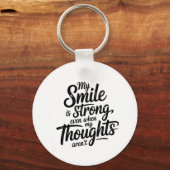 Sterke glimlach, stille strijd sleutelhanger (Achterkant)