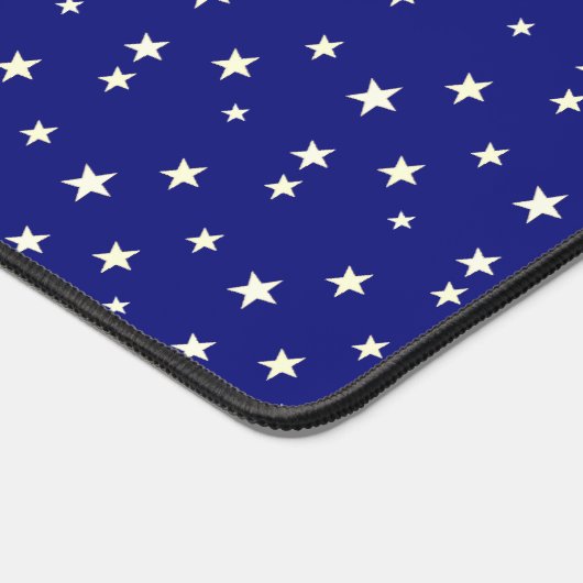Sterren op blauwe achtergrond bureaumat (Hoek)