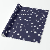 Sterren op donkerblauw cadeaupapier (Uitgerold)