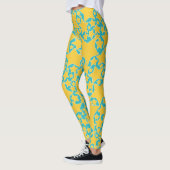 Sterren, sterren, sterren in het geel en turquoise leggings (Links)