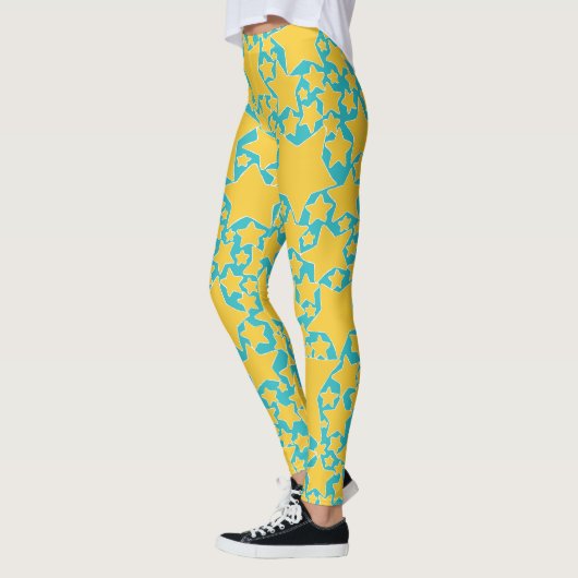 Sterren, sterren, sterren in het geel en turquoise leggings (Links)