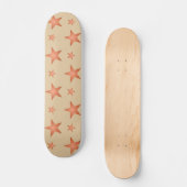 Sterrenpatroon in gradiënt terracotta sinaasappel persoonlijk skateboard (Voorkant)