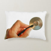 Stethoscoop in een hand voor een ziekenhuis sfeer. accent kussen (Achterkant)