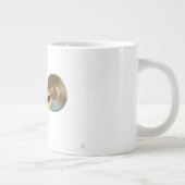 Stethoscoop in een hand voor een ziekenhuis sfeer. grote koffiekop (Rechts)