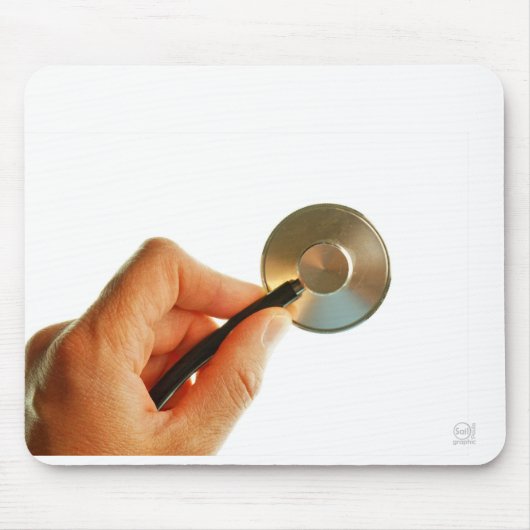 Stethoscoop in een hand voor een ziekenhuis sfeer. muismat (Voorkant)