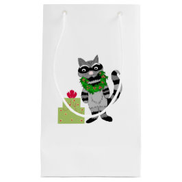 Stiekeme wasbeer met kerstcadeau klein cadeauzakje