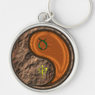 Stier en houten aap sleutelhanger