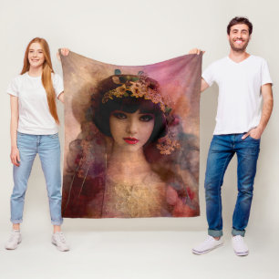 stijlportret van mooie vrouw in roze fleece deken