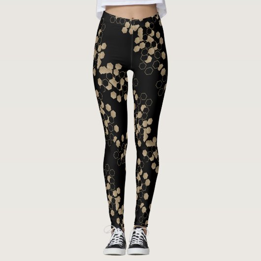 stijlvol geometrisch zwart-goudhexagonpatroon leggings (Voorkant)