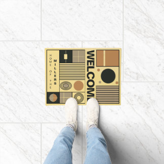 Stijlvol ontwerp in Bauhaus-stijl met familienaam Deurmat