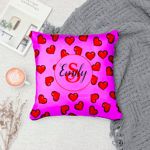 stijlvol rood hartpatroon op paarse monogram kussen