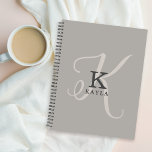 Stijlvol vrouwelijk monogram op neutrale achtergro planner<br><div class="desc">Stijlvol en mooi, dit unieke vrouwelijke monogram-ontwerp toont het initiaal van uw voornaam in zowel een eenvoudig serif-lettertype als een elegant kalligraflettertype op de achtergrond. Jouw naam wordt weergegeven onder uw monogram initiaal in dit unieke typografie aangepaste ontwerp. De drie elementen gaan samen met een verfijnde harmonie en creëer je...</div>