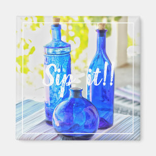 Stijlvolle, blauwe glazen flessen Sip het Magnet