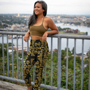 Stijlvolle gouden bloemenprint op zwart leggings
