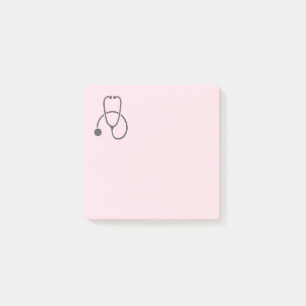 Stijlvolle grijze stethoscoop op pastroze post-it® notes