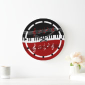 Stijlvolle rode zwarte witte pianotoetsen en notit grote klok (Huis)