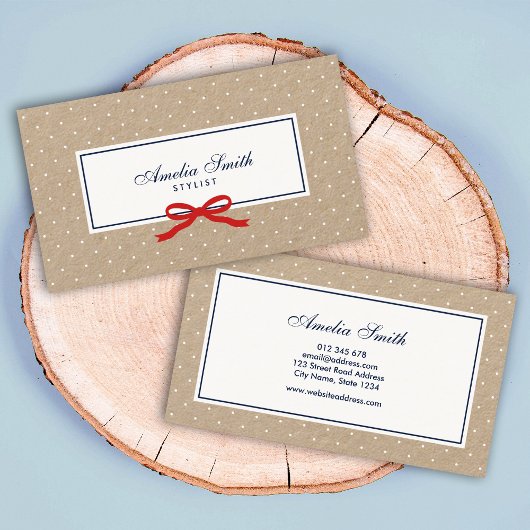 Stijlvolle witte polka dot en rode lint kraft visitekaartje