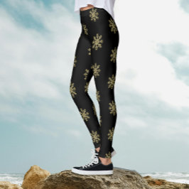 Stijlvolle zwarte en gouden glittersneeuwvlokpatro leggings