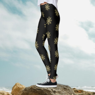 Stijlvolle zwarte en gouden glittersneeuwvlokpatro leggings