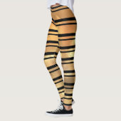 Stijlvolle zwarte en gouden glitterstripes leggings (Links)
