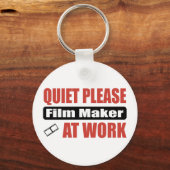 Stil alsjeblieft filmmaker op het werk sleutelhanger (Voorkant)