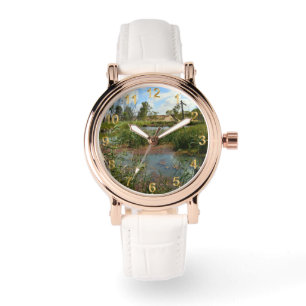 Stille Sereniteit: Een Groene Kikker op Riet in he Horloge