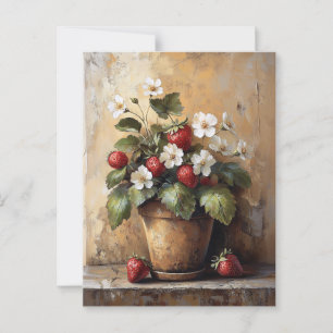 Stilleven met aardbeiplant in een pot in rustieke briefkaart