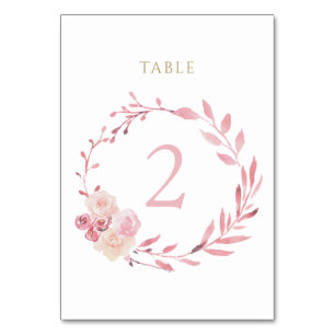 stoffige roze bloemenkrans tafel nummervoorziening kaart