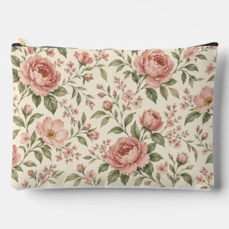 Stoffige roze bloemige make-uptas met saliegroene etui