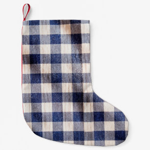 stolsel van blauwe gingham, textuur van shirten kleine kerstsok