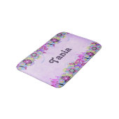 Stomme bloemen en vlinders op roze badmat (Gekanteld)