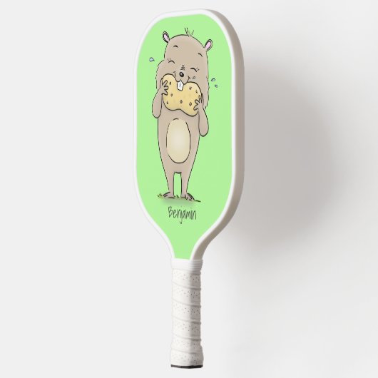 Stomme glimlachende hamster met pinda-cartoon pickleball paddle (Links)