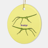 Stomme groene stokinsecten met gelukkige gezichten keramisch ornament (Links)