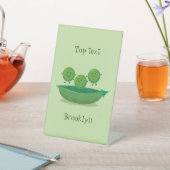 Stomme springerwten in de illustratie van de carto reclamebord met voetstuk (Insitu)