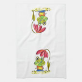 Stomme witte groene kikker onder een rode ventilat theedoek (Verticaal)