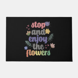 Stop en geniet van de bloemen deurmat