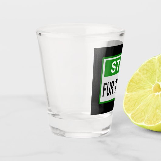 Stop het groene handelsteken van Fur Shot Glas (Links)