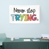 Stop nooit met proberen spandoek (Beurs)