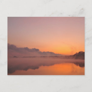 Stormfront aankomend, oranje zonsopgang bij het me briefkaart