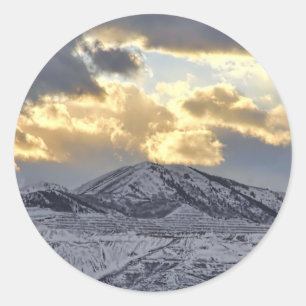 Stormy Sunset over Snow Capped Mountains Ronde Sticker