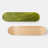 Stralen van psychedelische elektrische groen skateboard (Horizontaal)