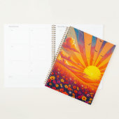 Stralende zonsondergang over grillig landschap planner (Display)