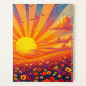 Stralende zonsondergang over grillig landschap planner (Achterkant)