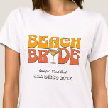 Strand Bachelorette Party Retro Groovy Beach Bride T-shirt<br><div class="desc">Maak een plons op uw aankomende vrijgezellenfeest met deze prachtige strand vrijgezellenfeest gepersonaliseerde t-shirts. Of je nu een stranduitstap, een meisjesvakantie of een beste vriendenvakantie viert, deze custom beach bachelorette party t-shirts zijn de perfecte aanvulling op je onvergetelijke uitje. Voeg een persoonlijk tintje toe aan je vrijgezellenfeestkleding met tekstopties. Stel...</div>