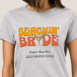 Strand Bachelorette Party Retro Strand Bruid T-shirt<br><div class="desc">Maak een plons op uw aankomende vrijgezellenfeest met deze prachtige strand vrijgezellenfeest gepersonaliseerde t-shirts. Of je nu een stranduitstap, een meisjesvakantie of een beste vriendenvakantie viert, deze custom beach bachelorette party t-shirts zijn de perfecte aanvulling op je onvergetelijke uitje. Voeg een persoonlijk tintje toe aan je vrijgezellenfeestkleding met tekstopties. Stel...</div>