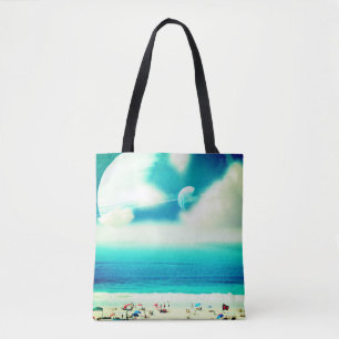 Strand en reuzenplaneten surreale reis tote bag